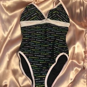 Burberry girls swimsuit size small( ON HOLD✨)